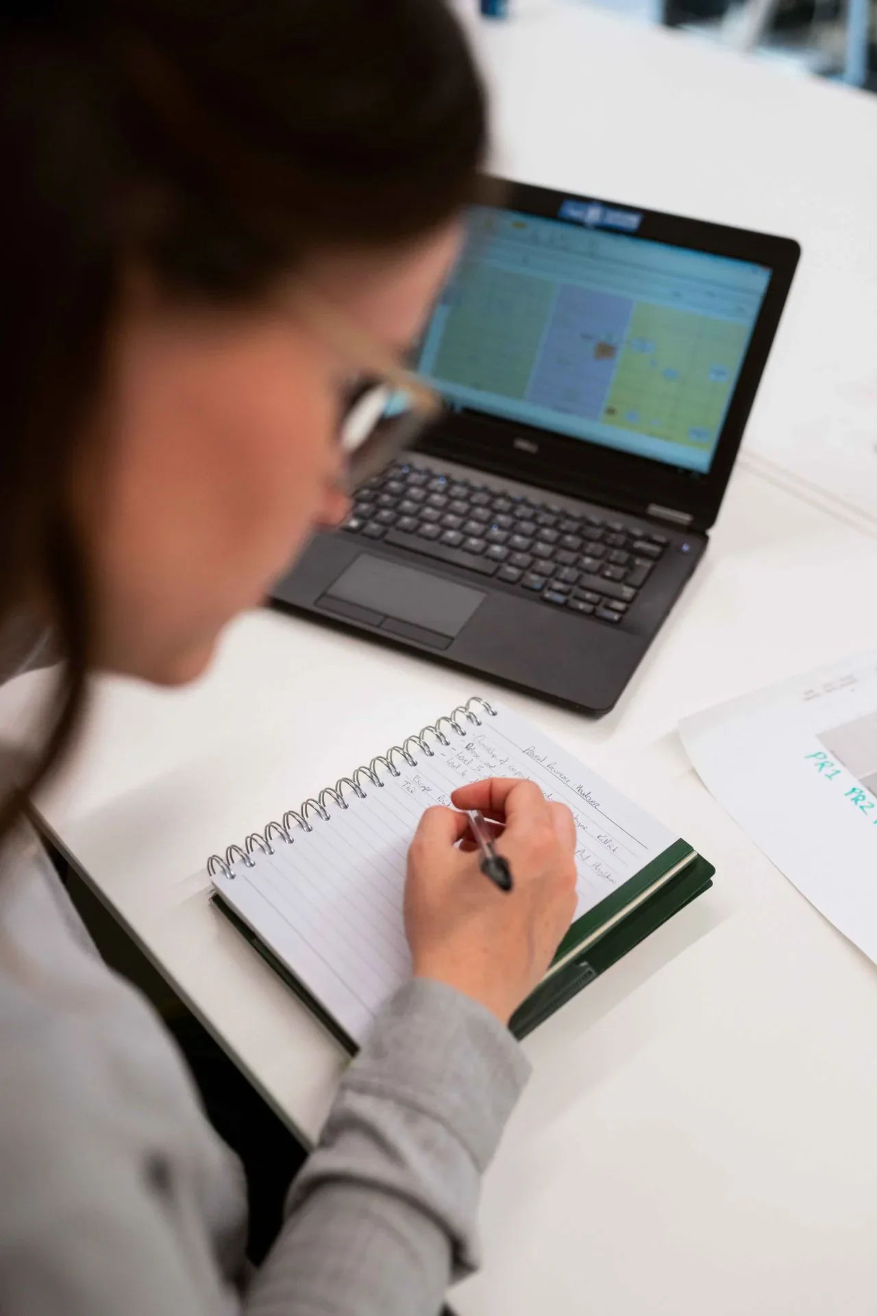 Small business owner reviewing a growth dashboard on a laptop